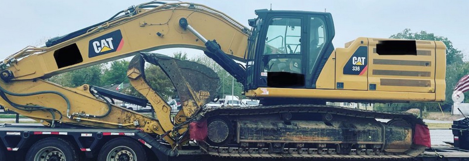 CAT 336 excavator on a heavy haul trailer