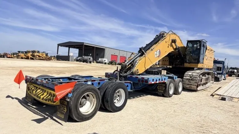 CAT 374 excavator on a beam trailer as a 138,000 lb super load