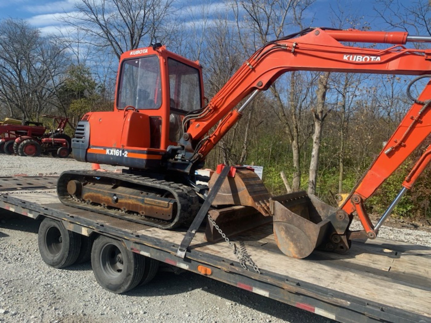 Kubota mini excavator secured on a hotshot trailer